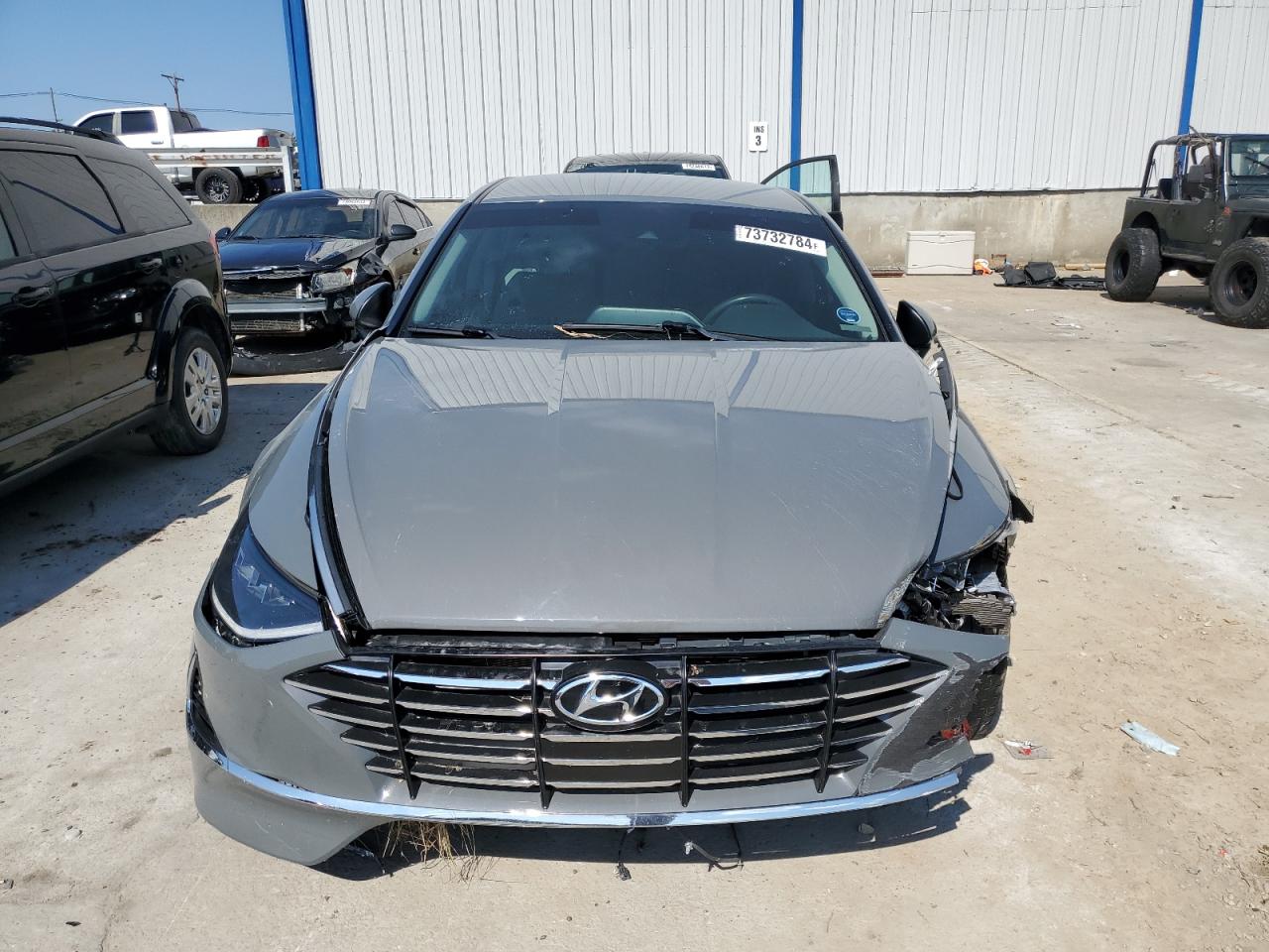 2022 Hyundai Sonata VIN 5NPEG4JAXNH144536 Copart auction photo, front end / rear end damage thumbnail 5