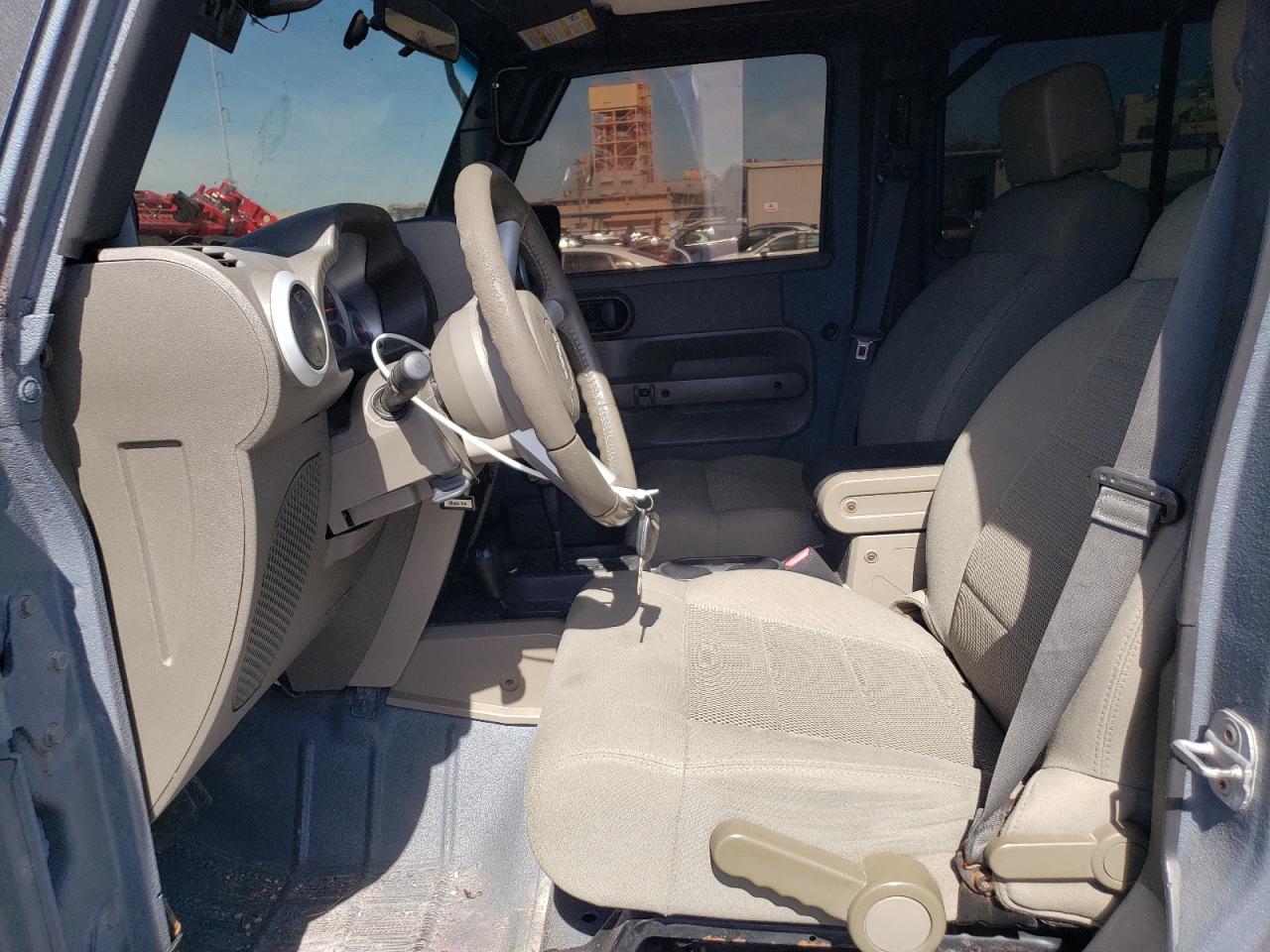 2009 Jeep Wrangler VIN 1J4GA59199L750023 Copart auction photo, minor dent/scratches damage thumbnail 7
