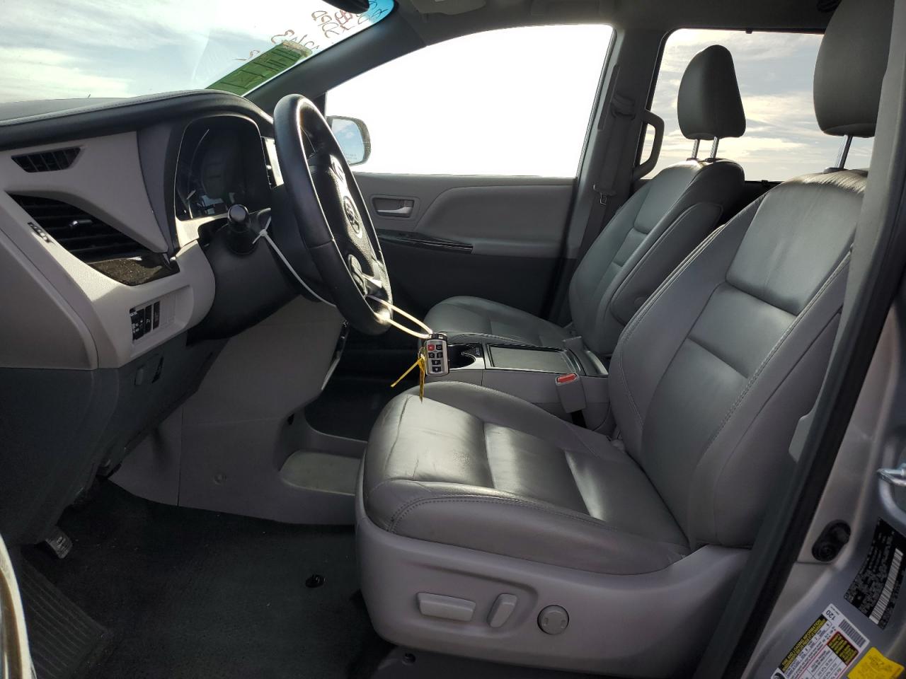 2015 Toyota Sienna VIN 5TDYK3DC6FS654073 Copart auction photo, all over damage thumbnail 7