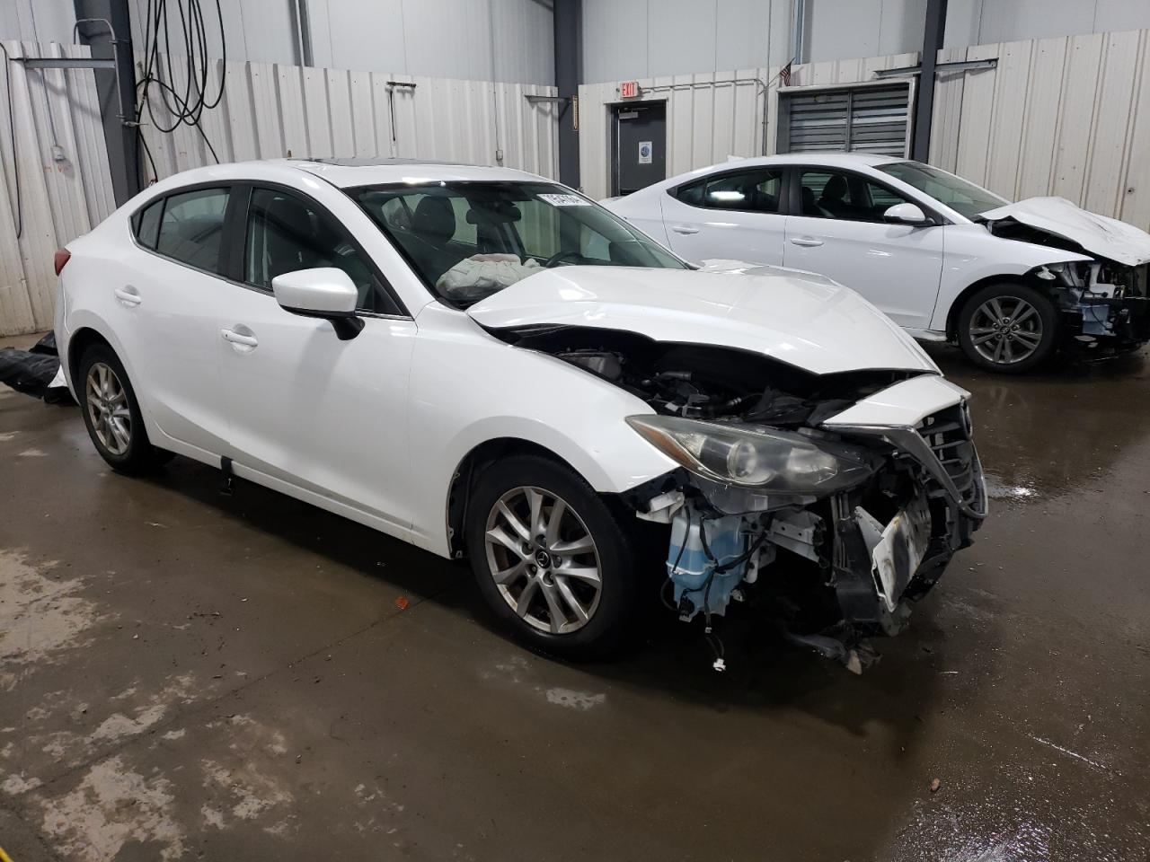 2014 Mazda 3 VIN JM1BM1W75E1124189 Copart auction photo, front end damage thumbnail 4