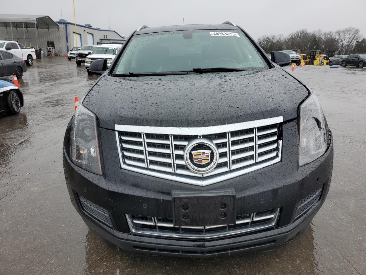 2015 Cadillac SRX VIN 3GYFNBE37FS558417 Copart auction photo, front end / side damage thumbnail 5