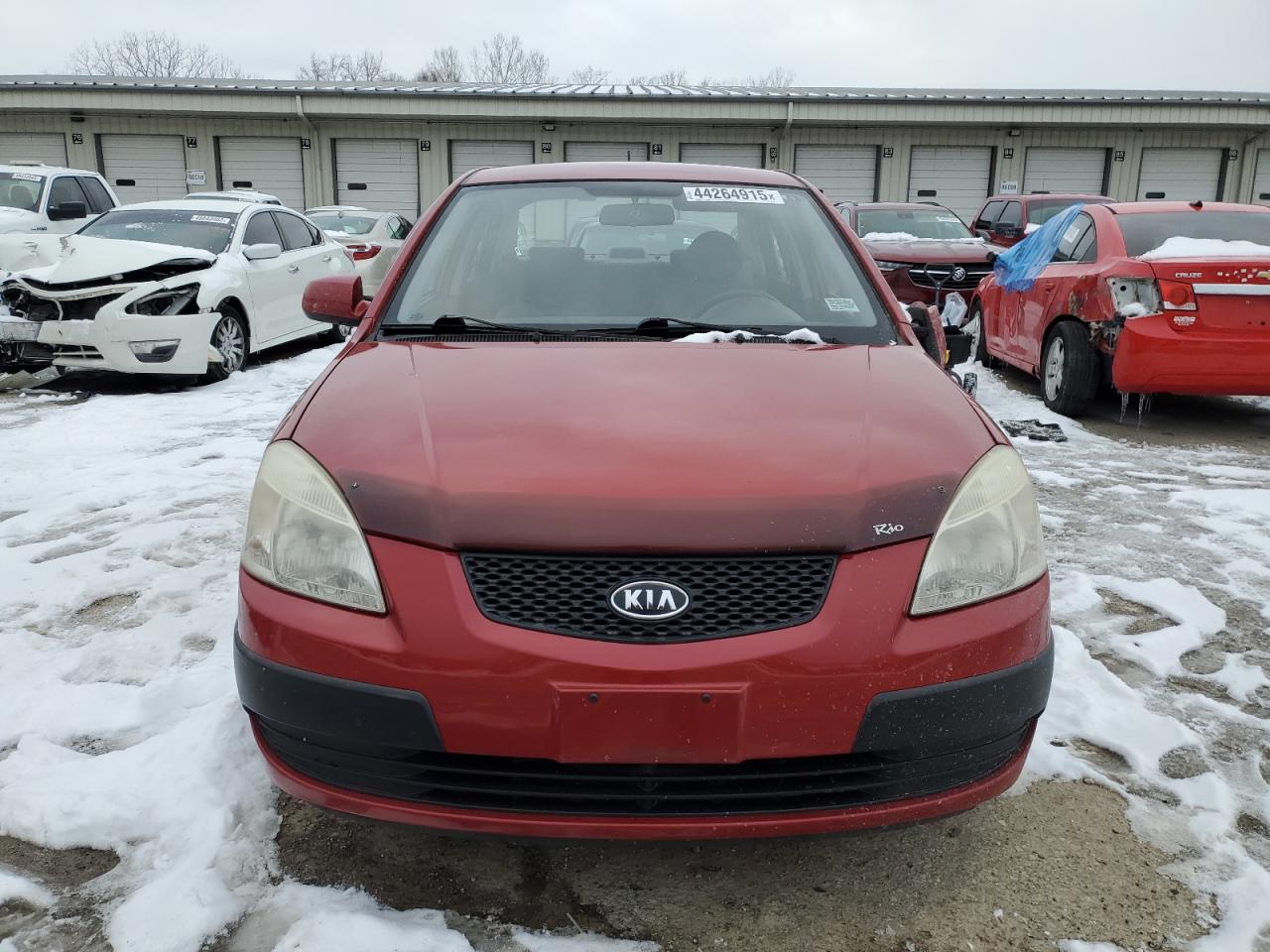 2009 KIA Rio VIN KNADE223296534033 Copart auction photo, top/roof damage thumbnail 5