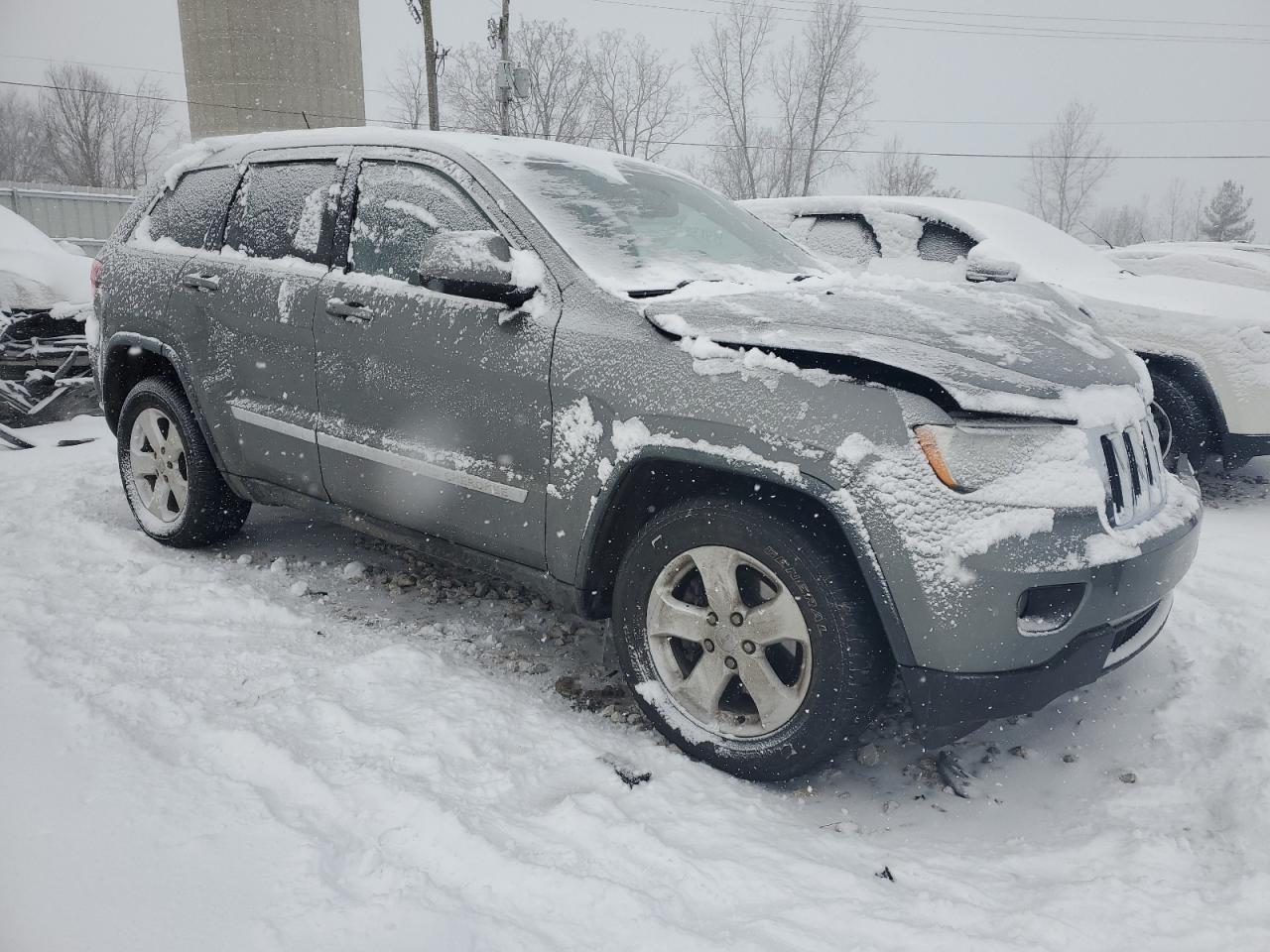 2011 Jeep Grand Cherokee VIN 1J4RR4GG7BC642363 Copart auction photo, front end damage thumbnail 4
