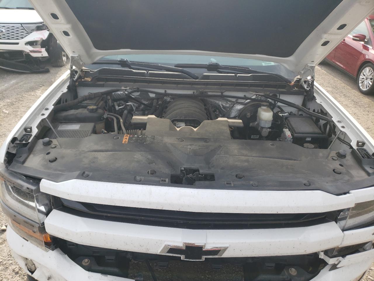 2017 Chevrolet Silverado VIN 3GCUKREC2HG413886 Copart auction photo, front end / minor dent/scratches damage thumbnail 13