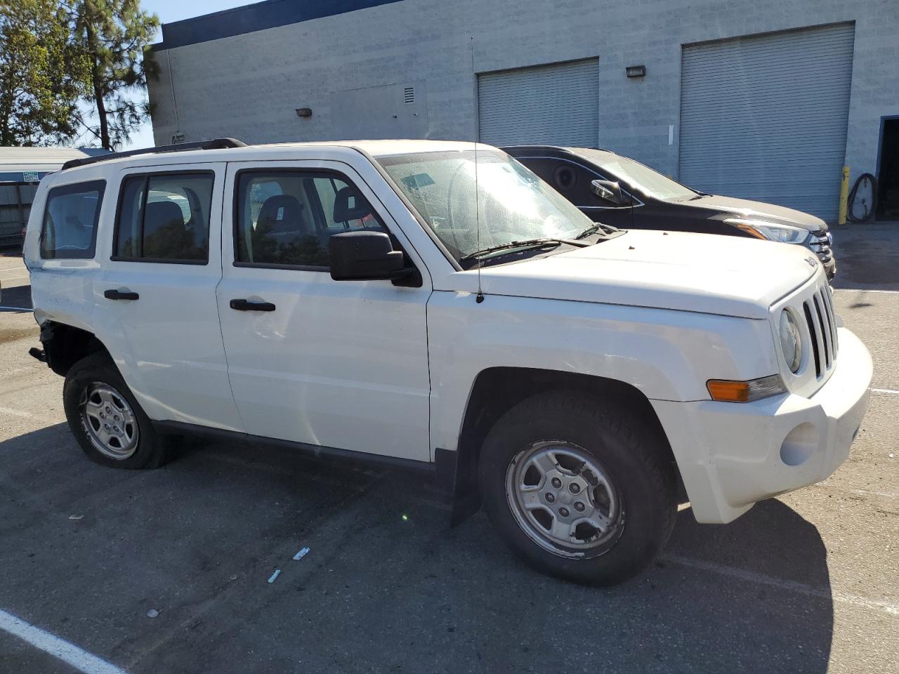 2009 Jeep Liberty (Patriot) VIN 1J4FT28A59D140653 Copart auction photo, rear end / stripped damage thumbnail 4