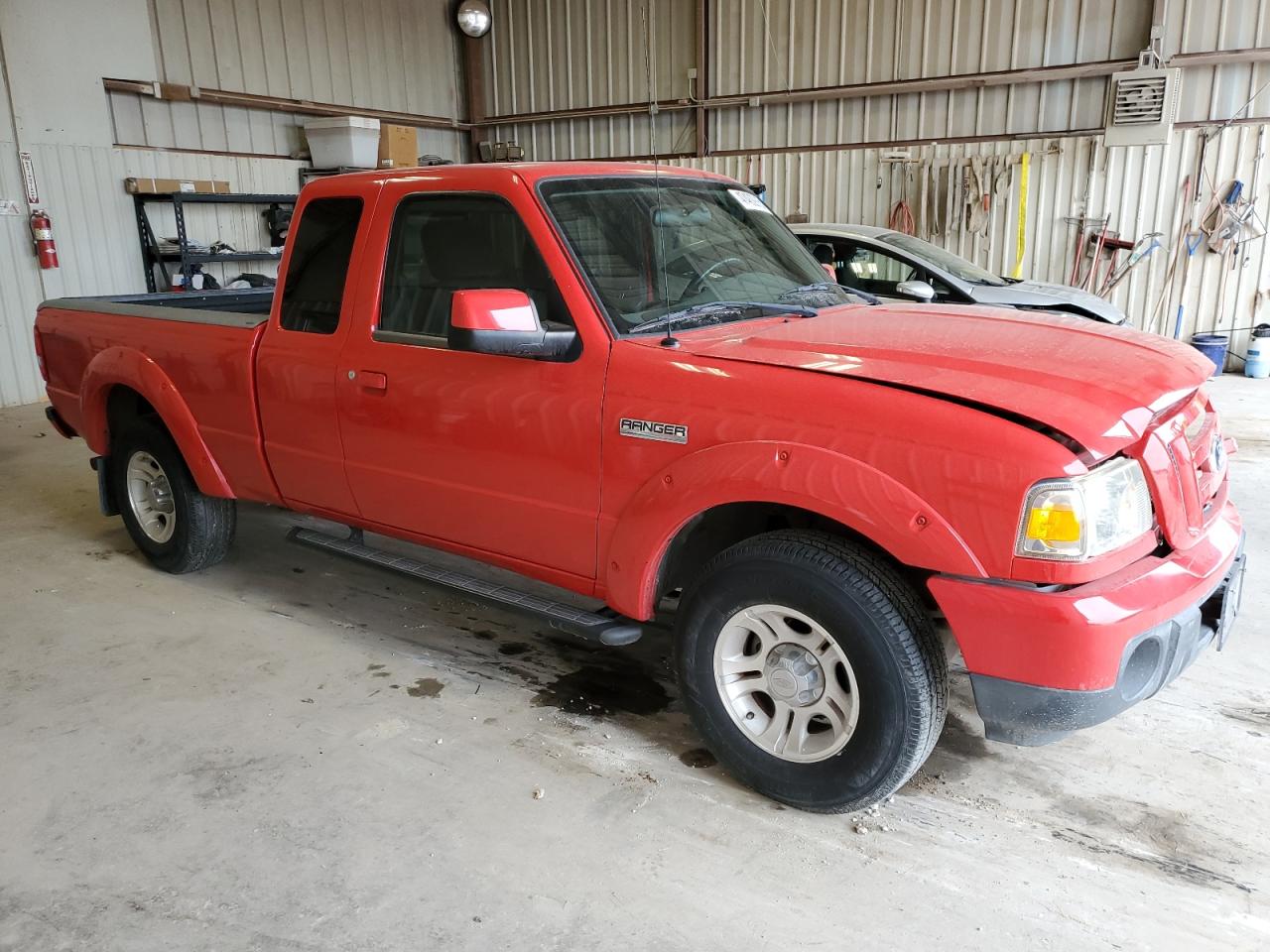 2011 Ford Ranger VIN 1FTKR4EE1BPA71504 Copart auction photo, front end / minor dent/scratches damage thumbnail 4
