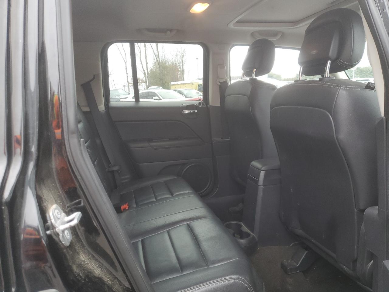 2014 Jeep Liberty (Patriot) VIN 1C4NJPFA0ED731667 Copart auction photo, minor dent/scratches damage thumbnail 11