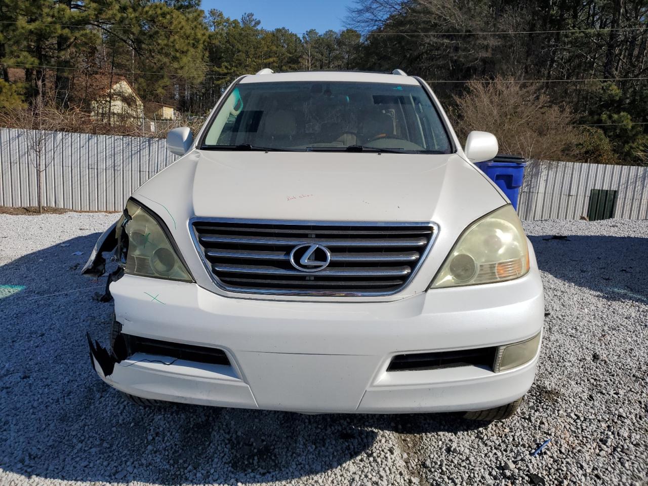 2005 Lexus GX VIN JTJBT20X250094590 Copart auction photo, front end / minor dent/scratches damage thumbnail 5