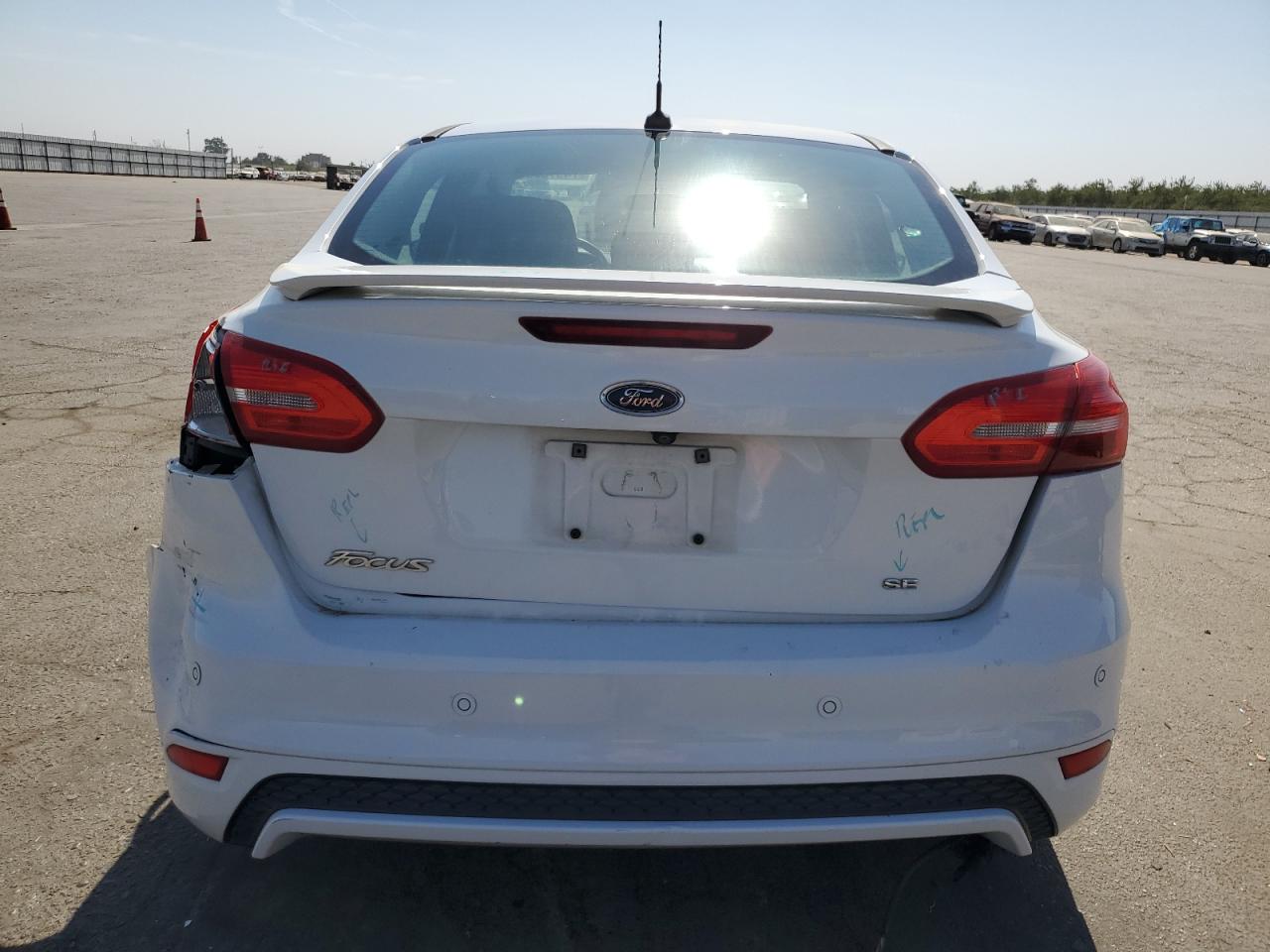 2015 Ford Focus VIN 1FADP3F22FL375621 Copart auction photo, rear end damage thumbnail 6