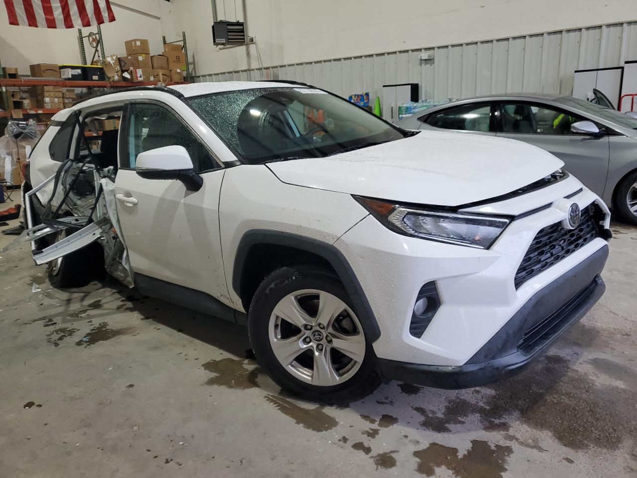2021 Toyota RAV 4 VIN 2T3W1RFV0MC098870 Copart auction photo, all over damage thumbnail 4