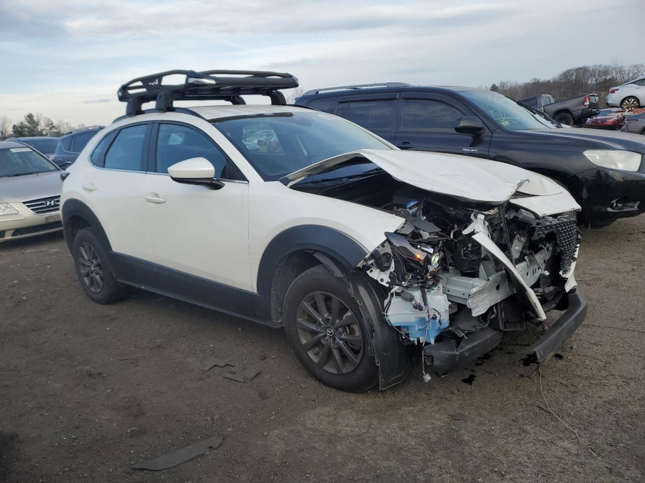 2023 Mazda CX-30 VIN 3MVDMBAM4PM581091 Copart auction photo, front end damage thumbnail 4