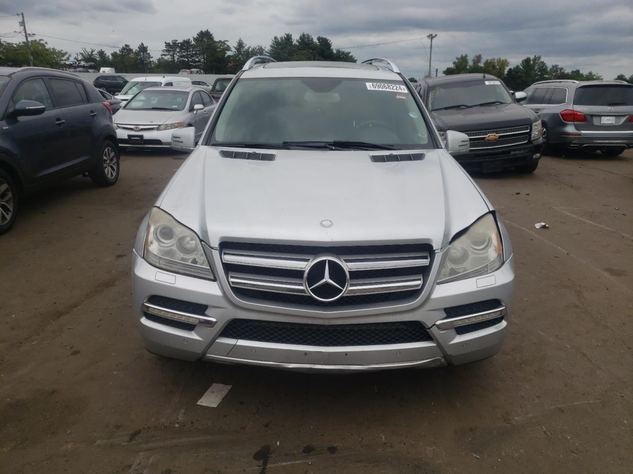 2012 Mercedes-Benz GL-klasse VIN 4JGBF7BE3CA781342 Copart auction photo, minor dent/scratches damage thumbnail 5