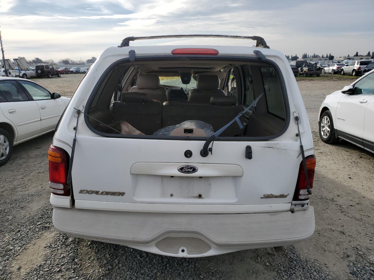 1999 Ford Explorer VIN 1FMZU35P1XZA10234 Copart auction photo, all over damage thumbnail 6