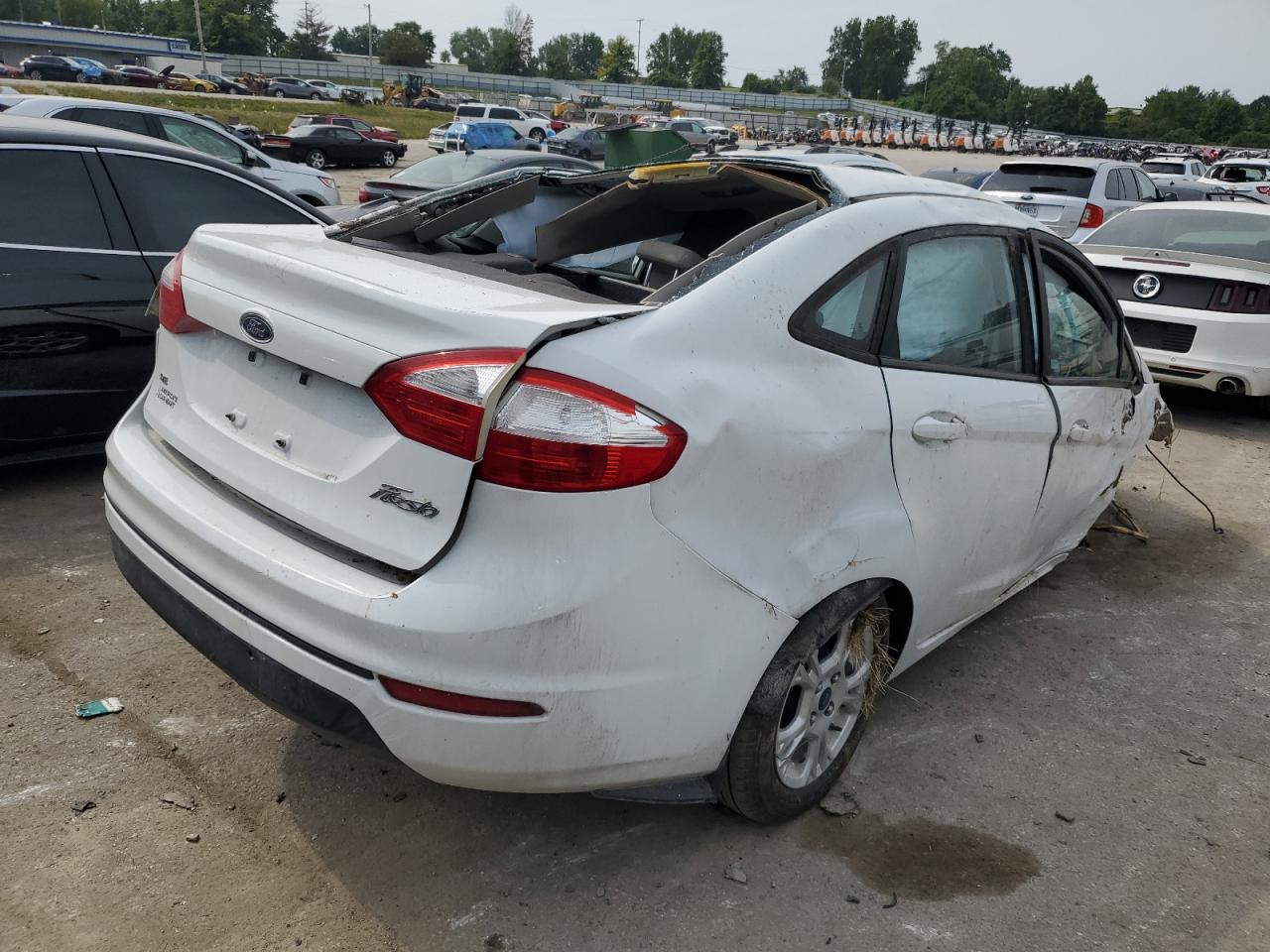 2014 Ford Fiesta VIN 3FADP4BJ5EM189569 Copart auction photo, all over damage thumbnail 3