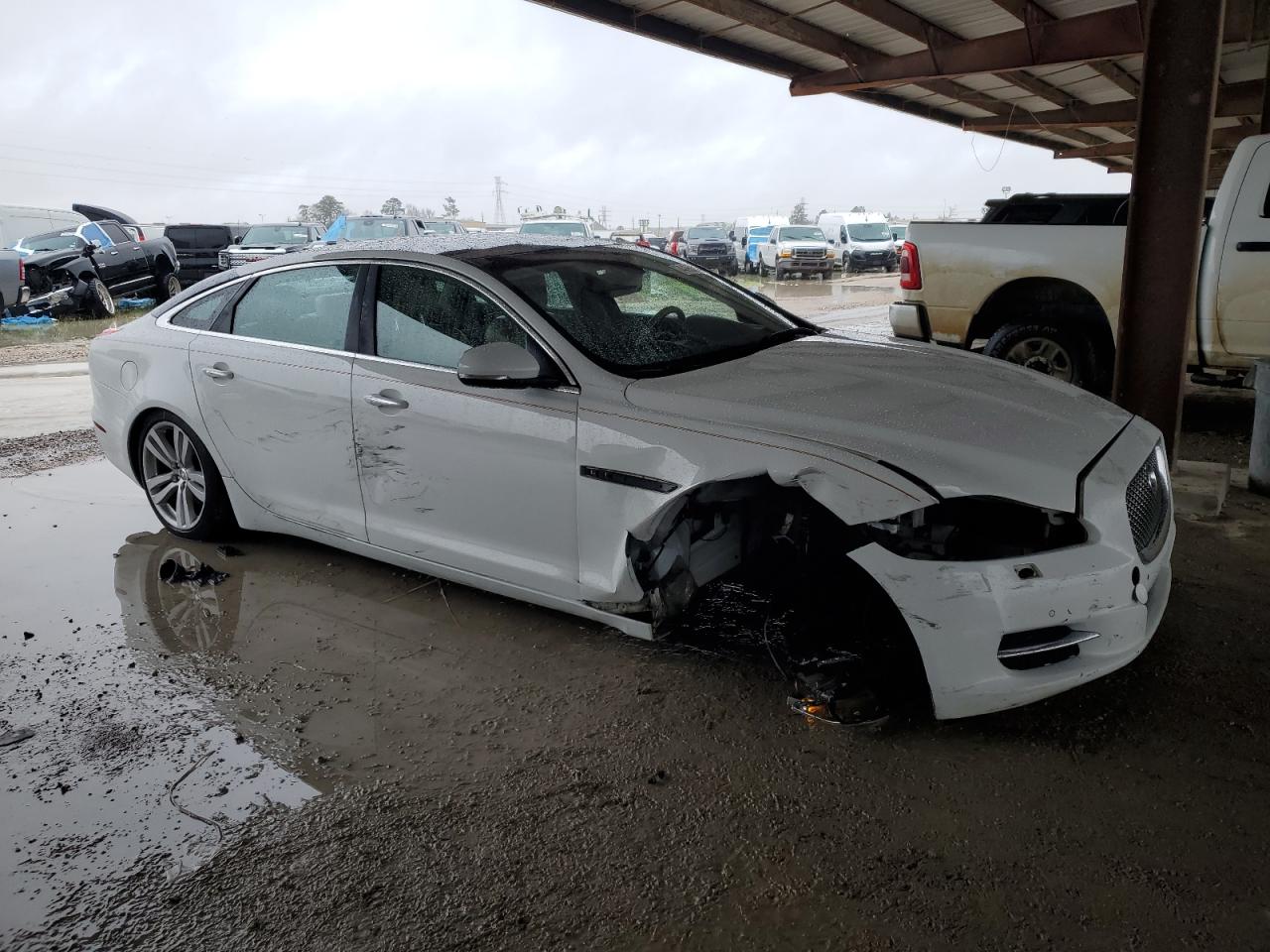 2013 Jaguar XJ VIN SAJWJ2GD4D8V47695 Copart auction photo, side / front end damage thumbnail 4
