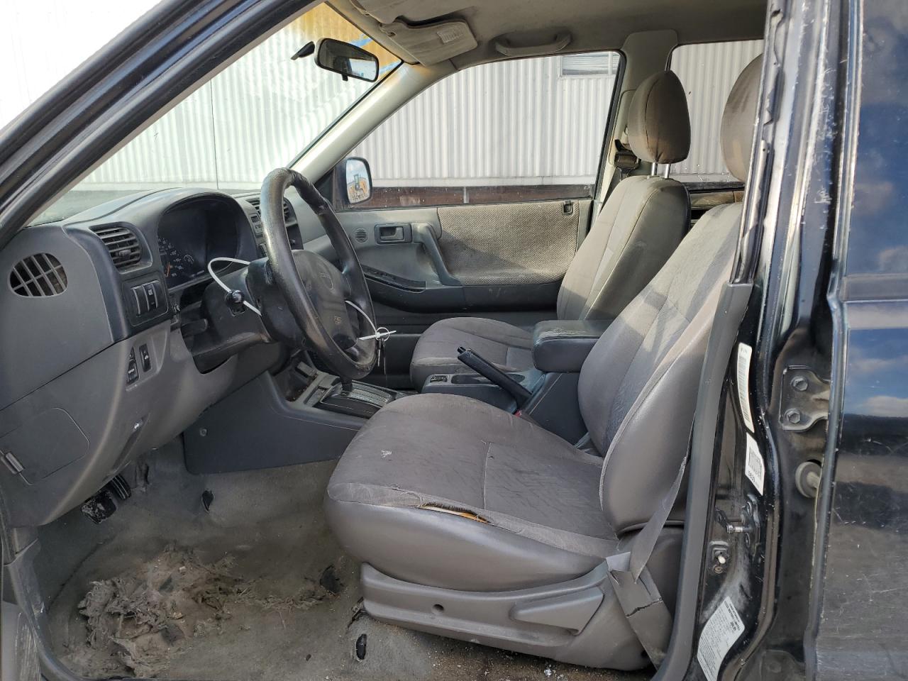 1999 Isuzu Rodeo VIN 4S2CK58W3X4362974 Copart auction photo, side damage thumbnail 7
