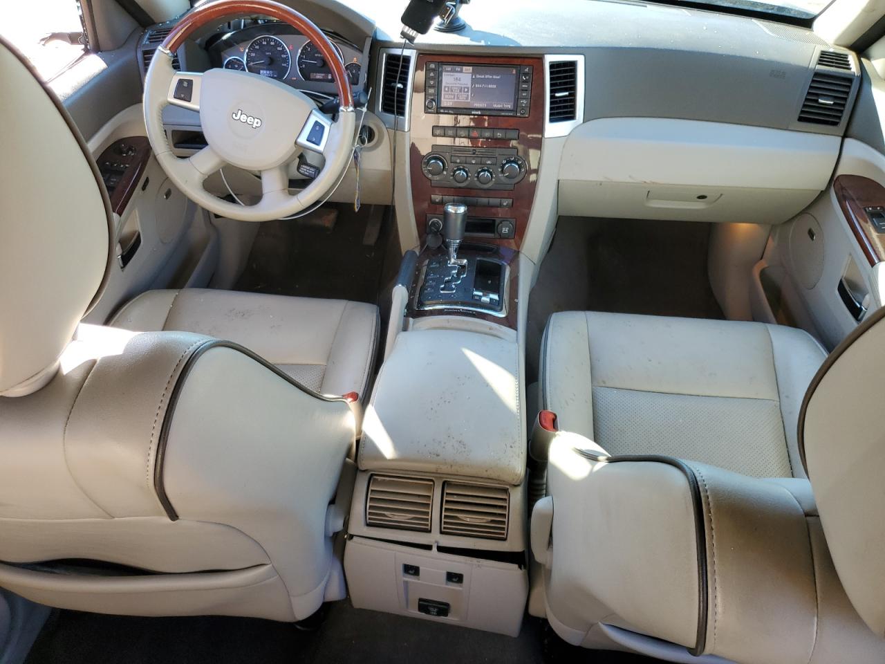 2009 Jeep Grand Cherokee VIN 1J8HR68T19C550936 Copart auction photo, all over damage thumbnail 8
