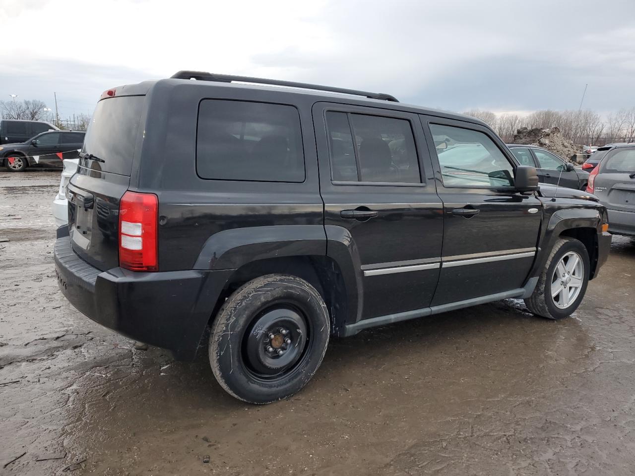 2010 Jeep Liberty (Patriot) VIN 1J4NT1GA8AD625784 Copart auction photo, minor dent/scratches damage thumbnail 3