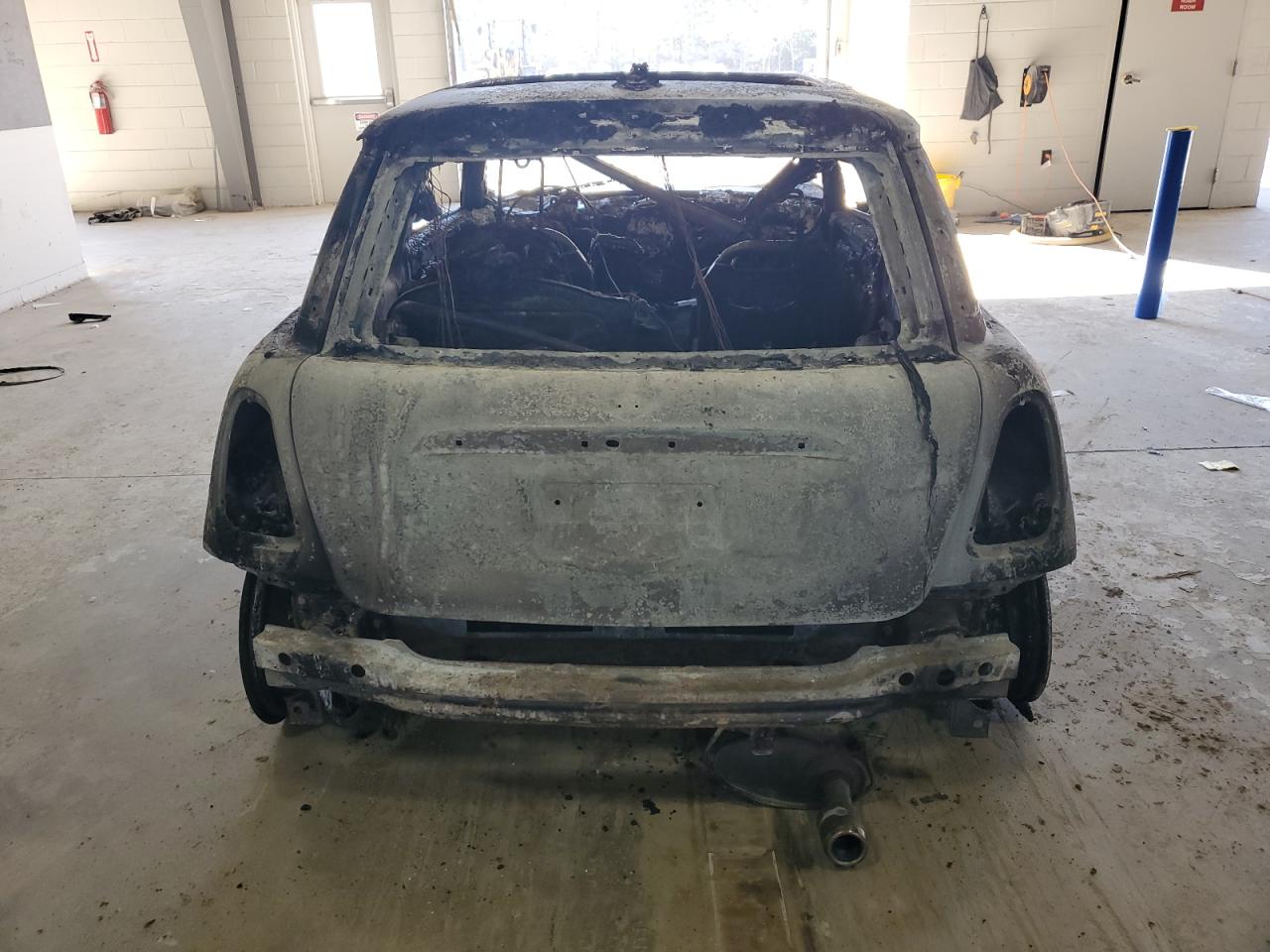 2010 MINI Cooper VIN WMWMF3C51ATZ27238 Copart auction photo, burn damage thumbnail 6