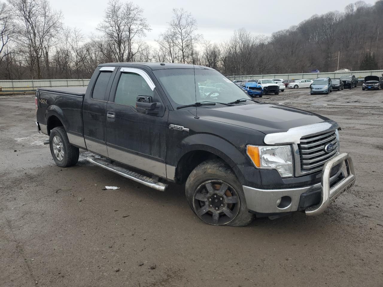 2011 Ford F-150 VIN 1FTFX1EF1BFC34107 Copart auction photo, front end / side damage thumbnail 4