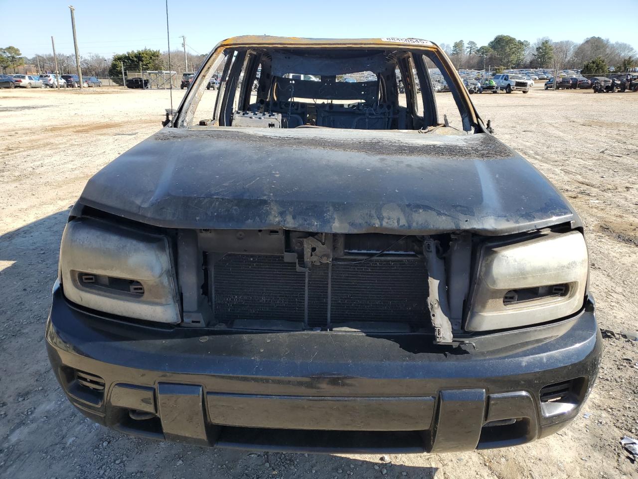 2004 Chevrolet TrailBlazer VIN 1GNDT13S642312160 Copart auction photo, burn damage thumbnail 5