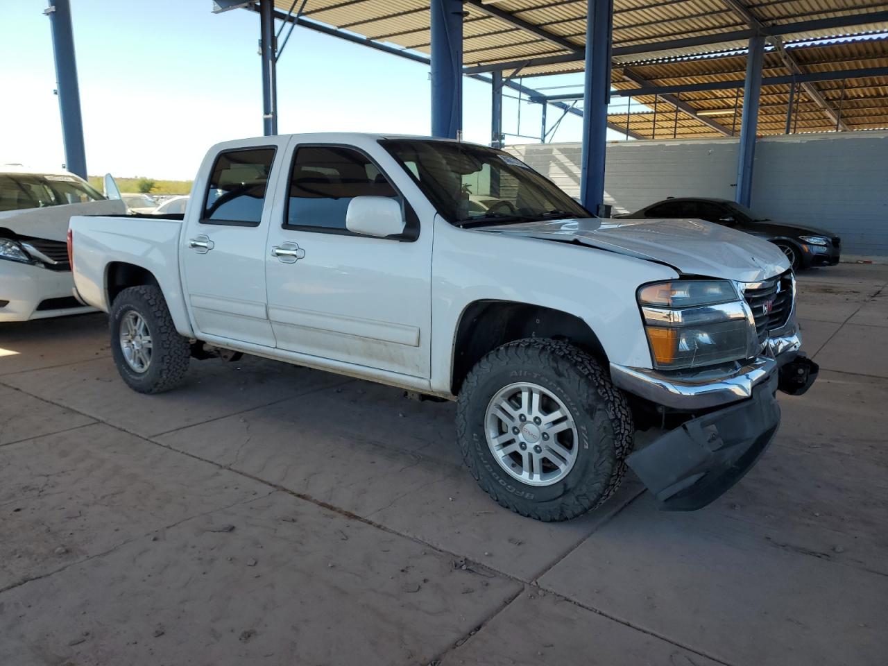 2012 GMC Canyon VIN 1GTH6MFE5C8126517 Copart auction photo, front end damage thumbnail 4
