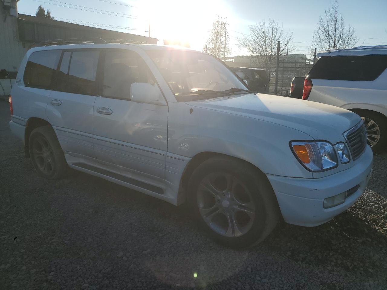 1999 Lexus LX VIN JT6HT00WXX0056382 Copart auction photo, minor dent/scratches damage thumbnail 4
