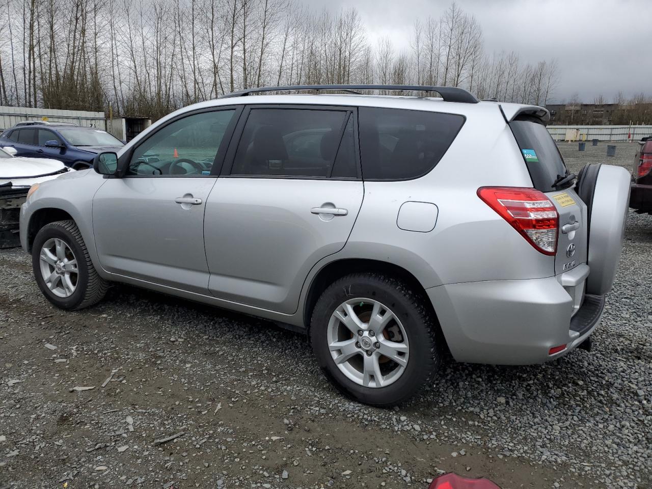 2012 Toyota RAV 4 VIN 2T3BF4DVXCW252360 Copart auction photo, side / rear end damage thumbnail 2