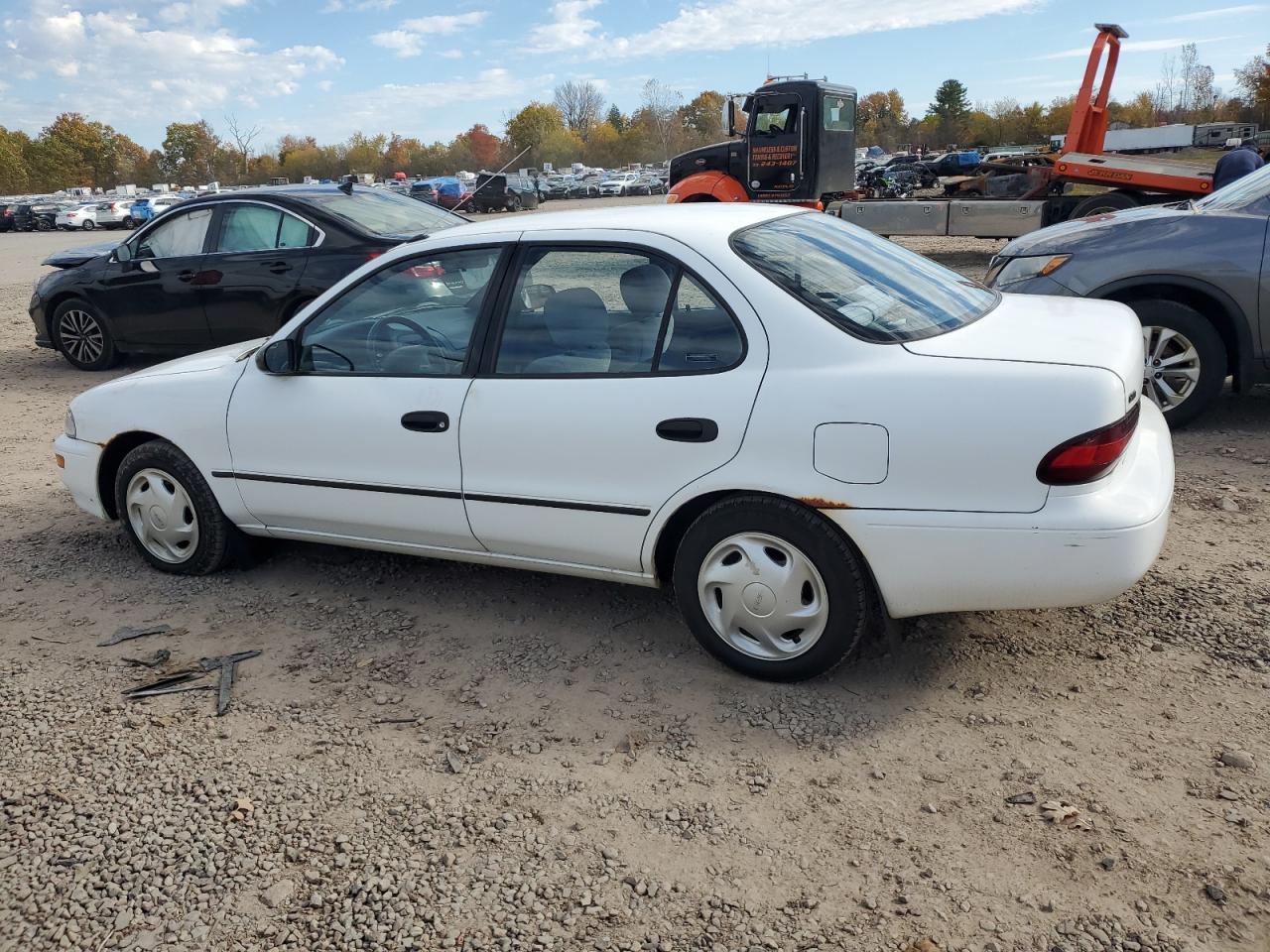 1996 GEO Prizm VIN 1Y1SK5261TZ028032 Copart auction photo, normal wear / minor dent/scratches damage thumbnail 2