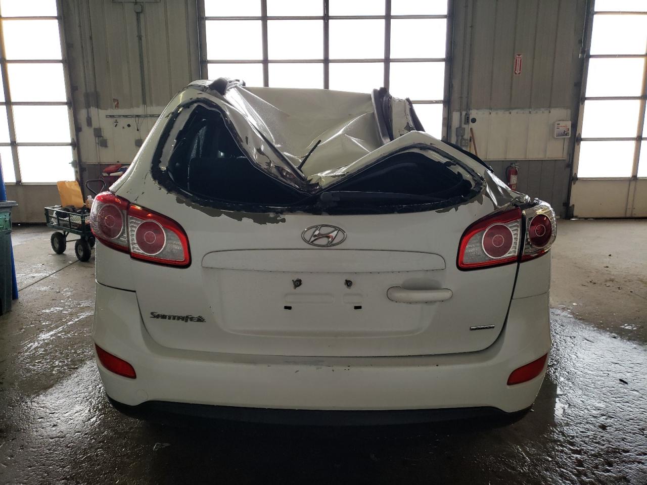 2012 Hyundai Santa Fe VIN 5XYZGDAB7CG165102 Copart auction photo, top/roof / minor dent/scratches damage thumbnail 6