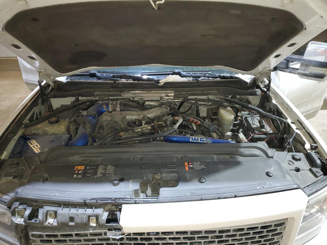 2015 GMC Sierra VIN 1GT120E88FF632473 Copart auction photo, side / front end damage thumbnail 12