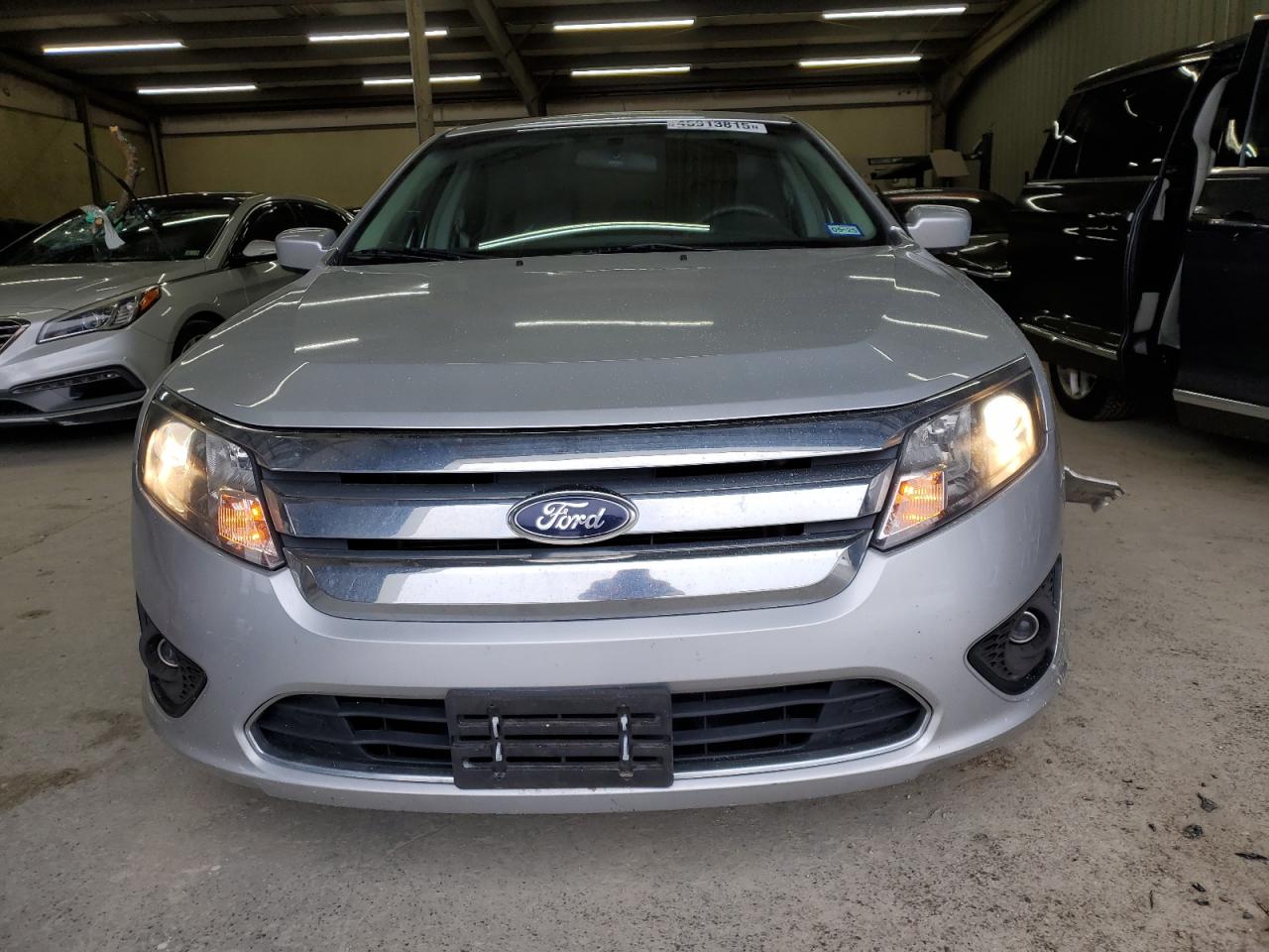2012 Ford Fusion VIN 3FAHP0HA4CR402514 Copart auction photo, front end / side damage thumbnail 5