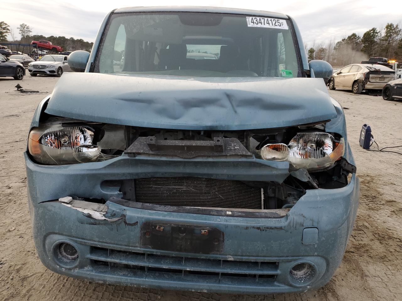 2010 Nissan Cube VIN JN8AZ2KR4AT151395 Copart auction photo, rear end / front end damage thumbnail 5