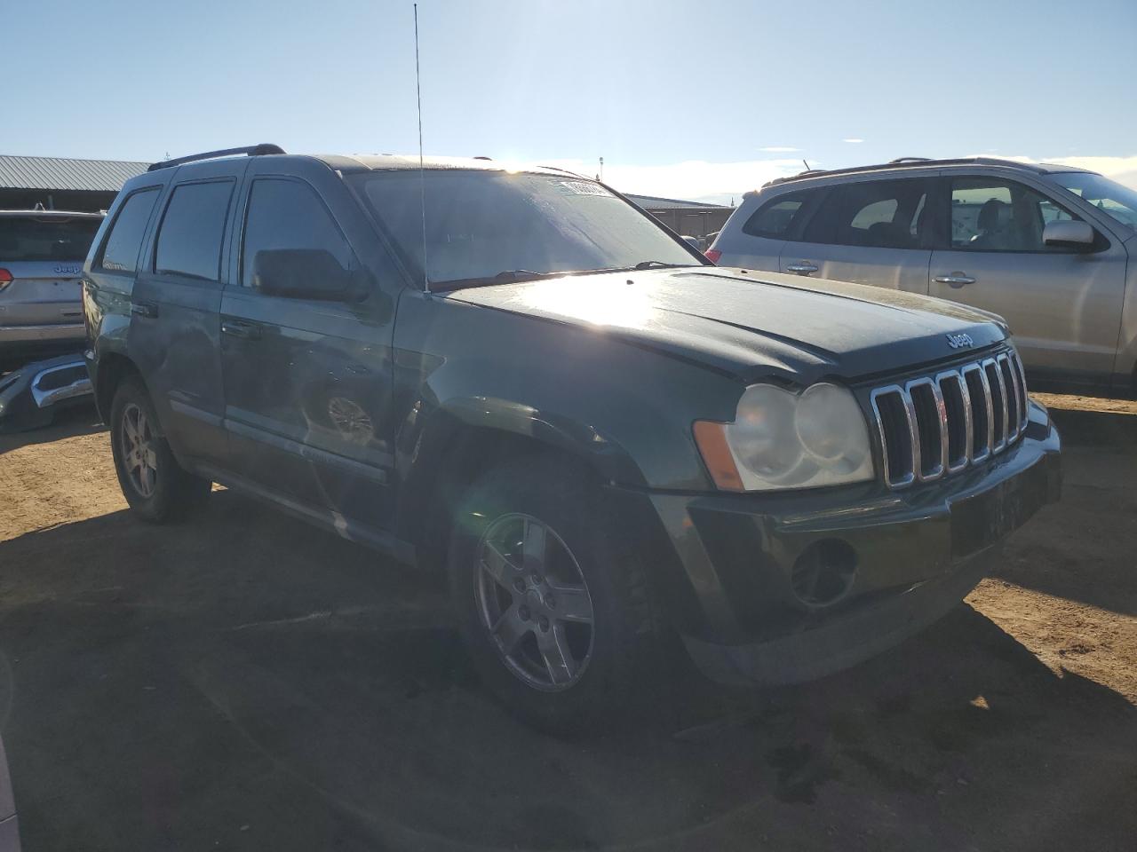 2007 Jeep Grand Cherokee VIN 1J8GR48K77C563873 Copart auction photo, rear end damage thumbnail 4