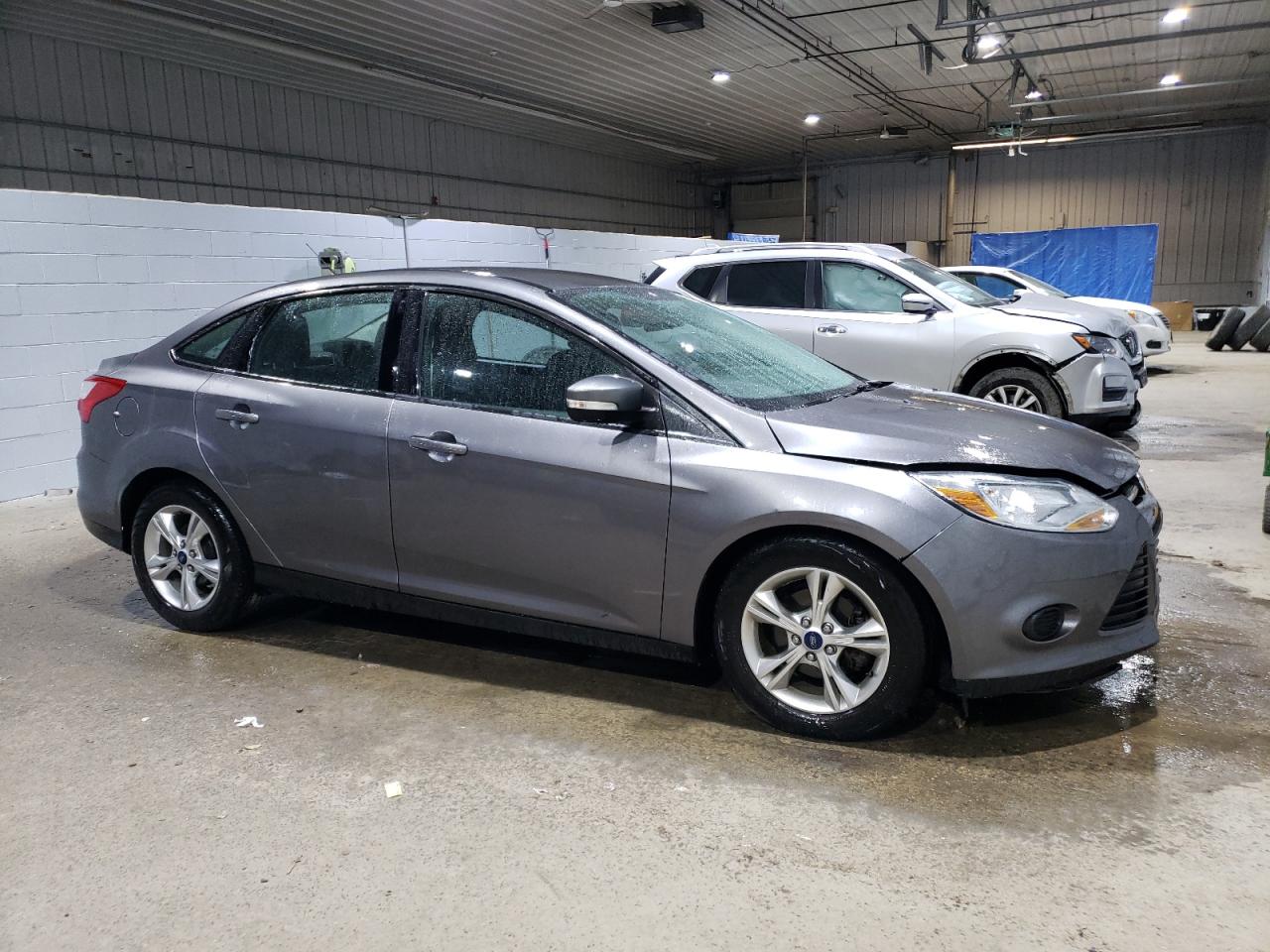 2014 Ford Focus VIN 1FADP3F23EL365887 Copart auction photo, front end / undercarriage damage thumbnail 4