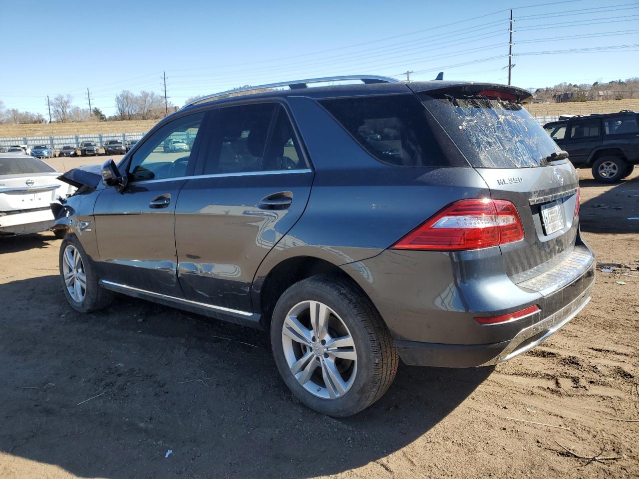 2012 Mercedes-Benz M-klasse VIN 4JGDA5HB8CA029483 Copart auction photo, front end / side damage thumbnail 2