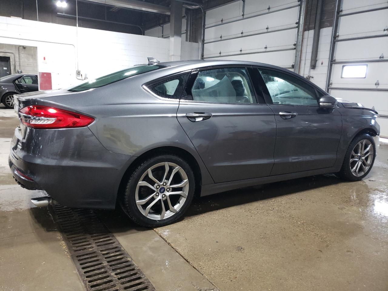 2020 Ford Fusion VIN 3FA6P0CD6LR170569 Copart auction photo, front end / side damage thumbnail 3