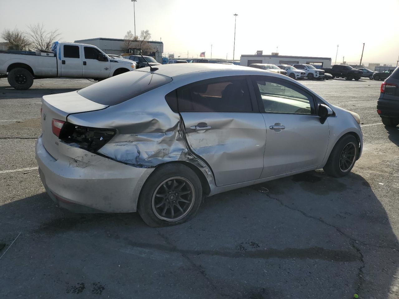 2016 KIA Rio VIN KNADM4A32G6565795 Copart auction photo, rear end / side damage thumbnail 3