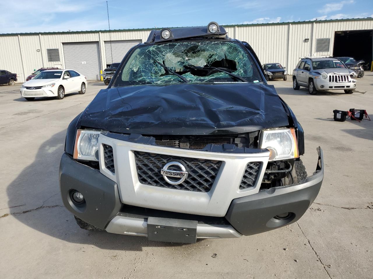 2011 Nissan XTerra VIN 5N1AN0NW8BC524674 Copart auction photo, all over damage thumbnail 5