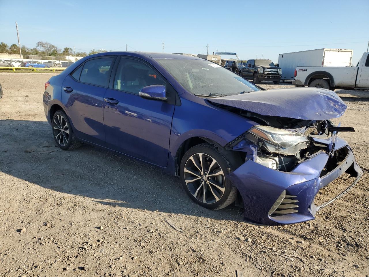 2018 Toyota Corolla VIN 5YFBURHEXJP743094 Copart auction photo, front end / side damage thumbnail 4