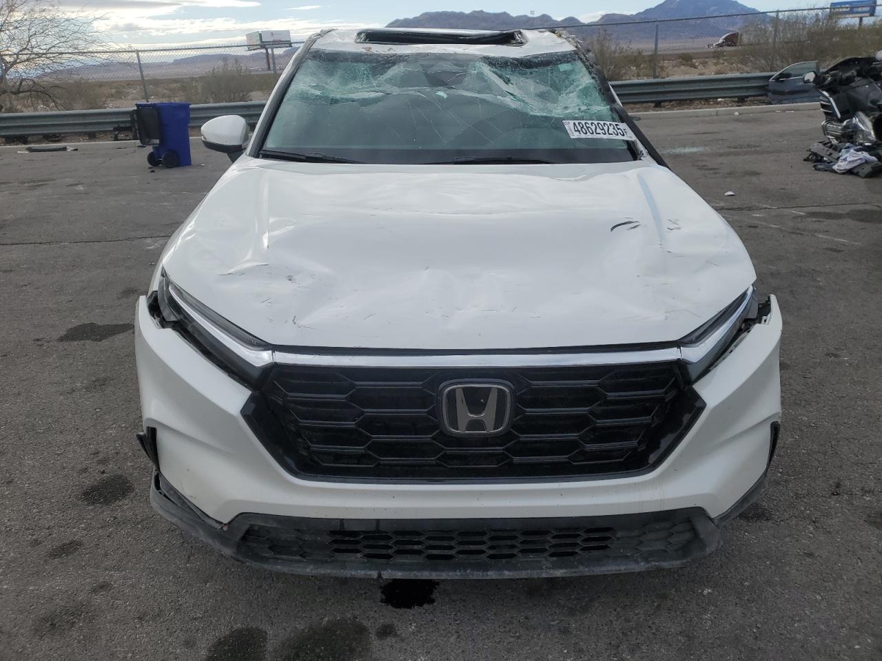 2023 Honda CR-V VIN 2HKRS3H44PH303757 Copart auction photo, rollover damage thumbnail 5