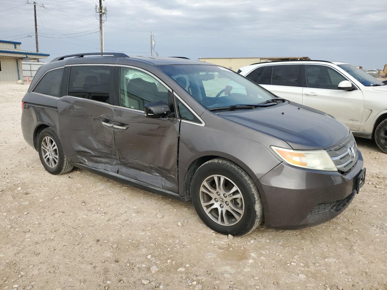 2012 Honda Odyssey VIN 5FNRL5H67CB142341 Copart auction photo, side / minor dent/scratches damage thumbnail 4