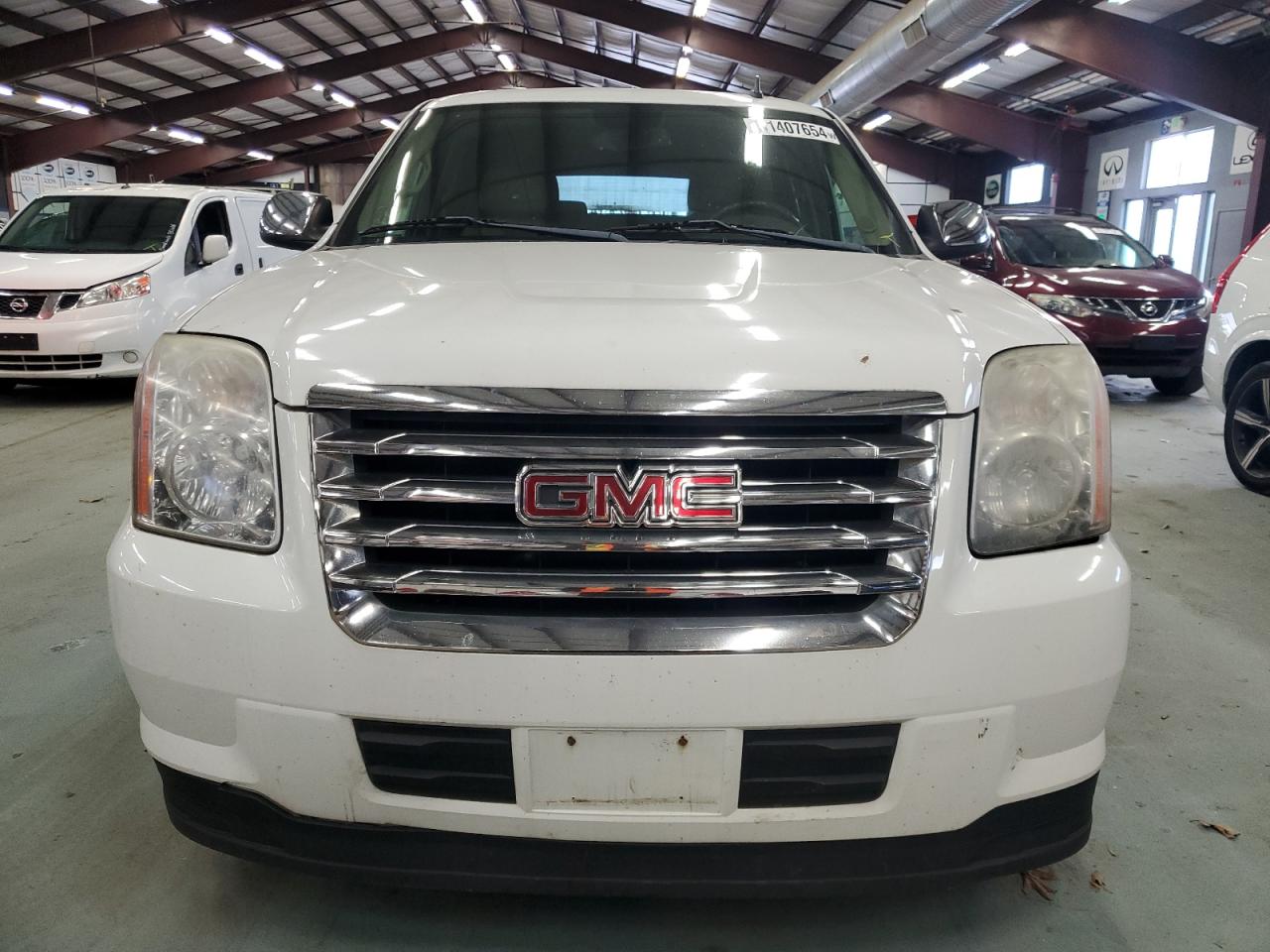 2009 GMC Yukon VIN 1GKFK13529R162534 Copart auction photo, minor dent/scratches / mechanical damage thumbnail 5