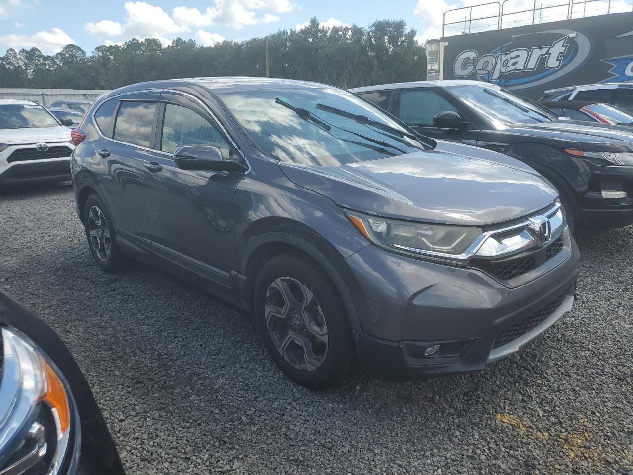 2018 Honda CR-V VIN 7FARW1H82JE050041 Copart auction photo, water/flood damage thumbnail 4