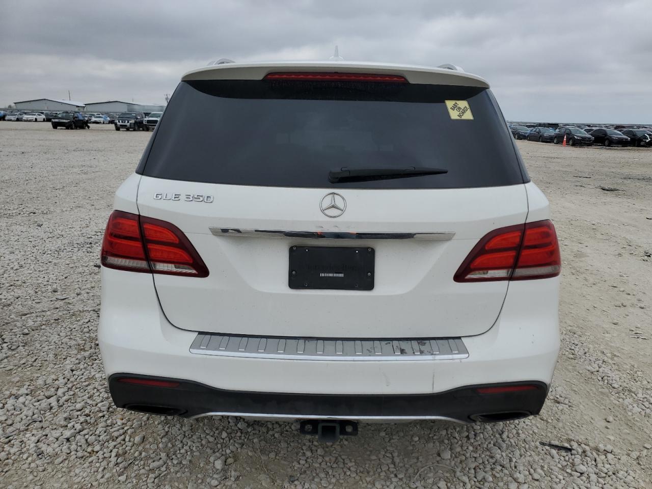 2016 Mercedes-Benz GLE VIN 4JGDA5JB7GA704336 Copart auction photo, side / front end damage thumbnail 6