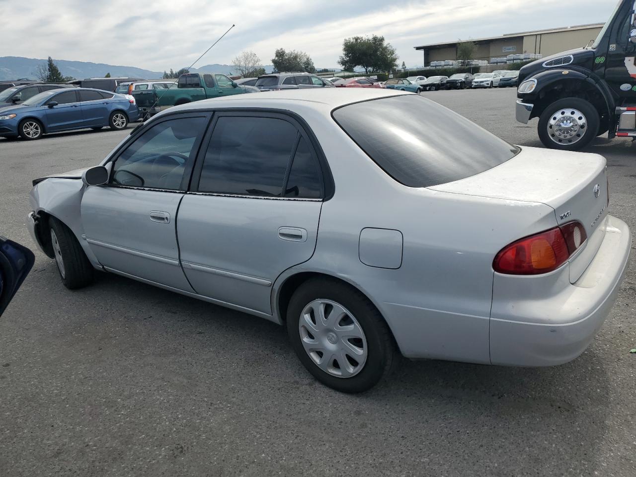 2001 Toyota Corolla VIN 1NXBR12E31Z428258 Copart auction photo, front end / side damage thumbnail 2
