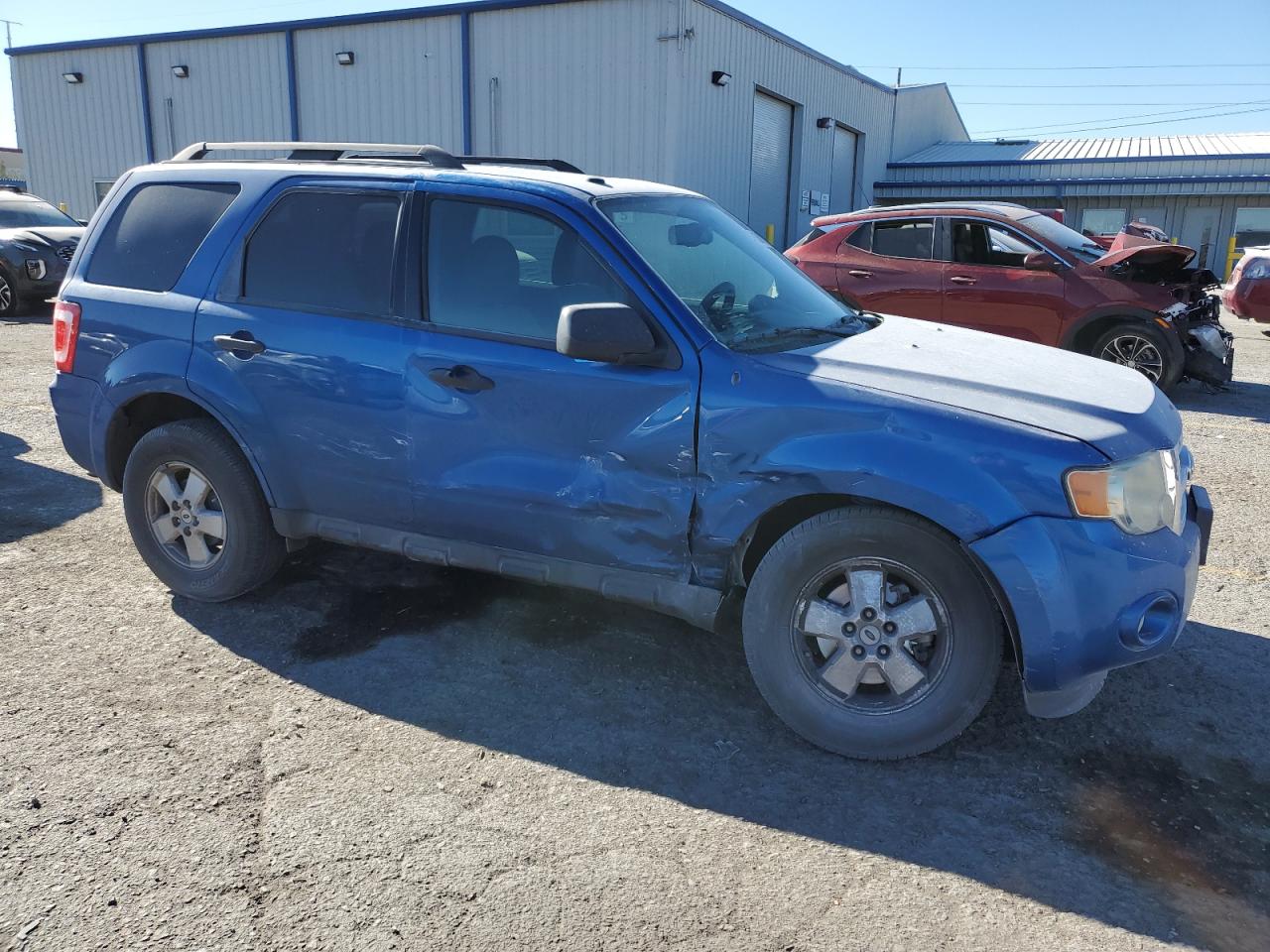 2011 Ford Escape VIN 1FMCU0D72BKB25450 Copart auction photo, front end / side damage thumbnail 4