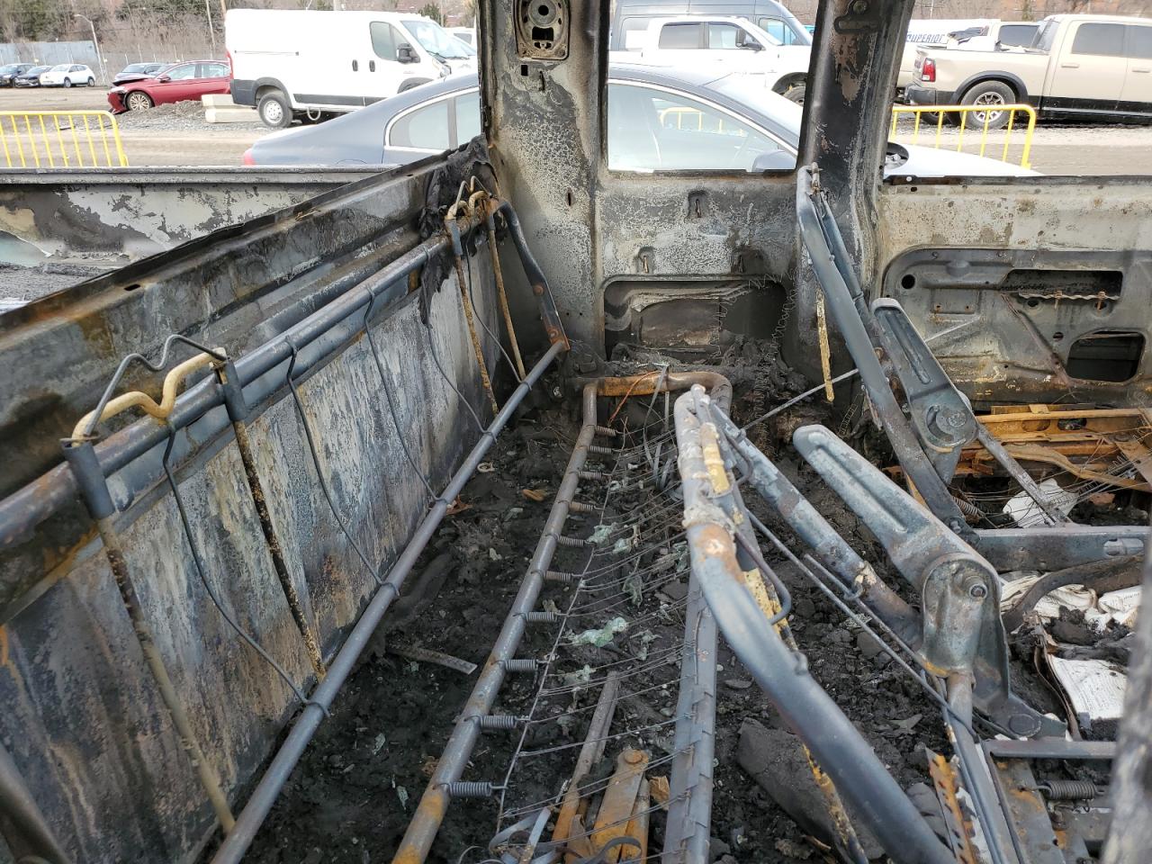 1995 GMC Sierra VIN 2GTEK19K0S1570324 Copart auction photo, burn damage thumbnail 10