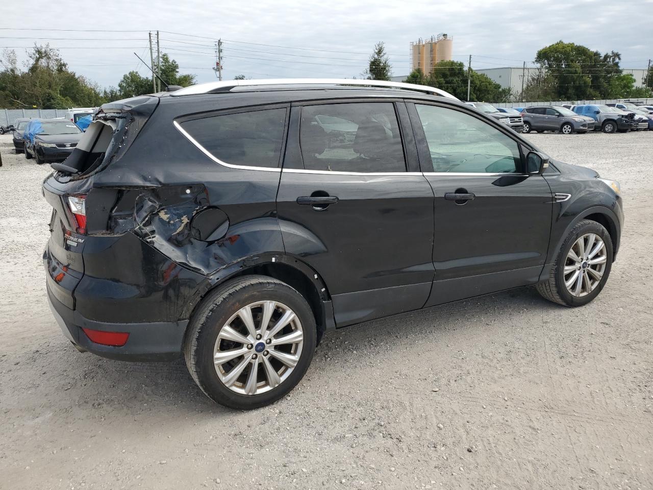 2017 Ford Escape VIN 1FMCU0JD0HUB05933 Copart auction photo, hail / rear end damage thumbnail 3