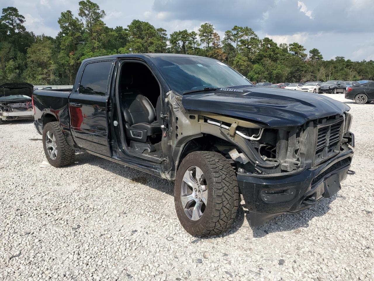 2020 RAM 1500 VIN 1C6SRFJT1LN386713 Copart auction photo, side / front end damage thumbnail 4
